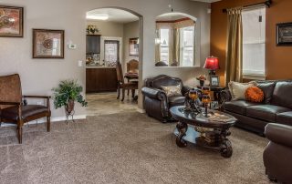 Formal great room with view the kitchen by CareFree Homes